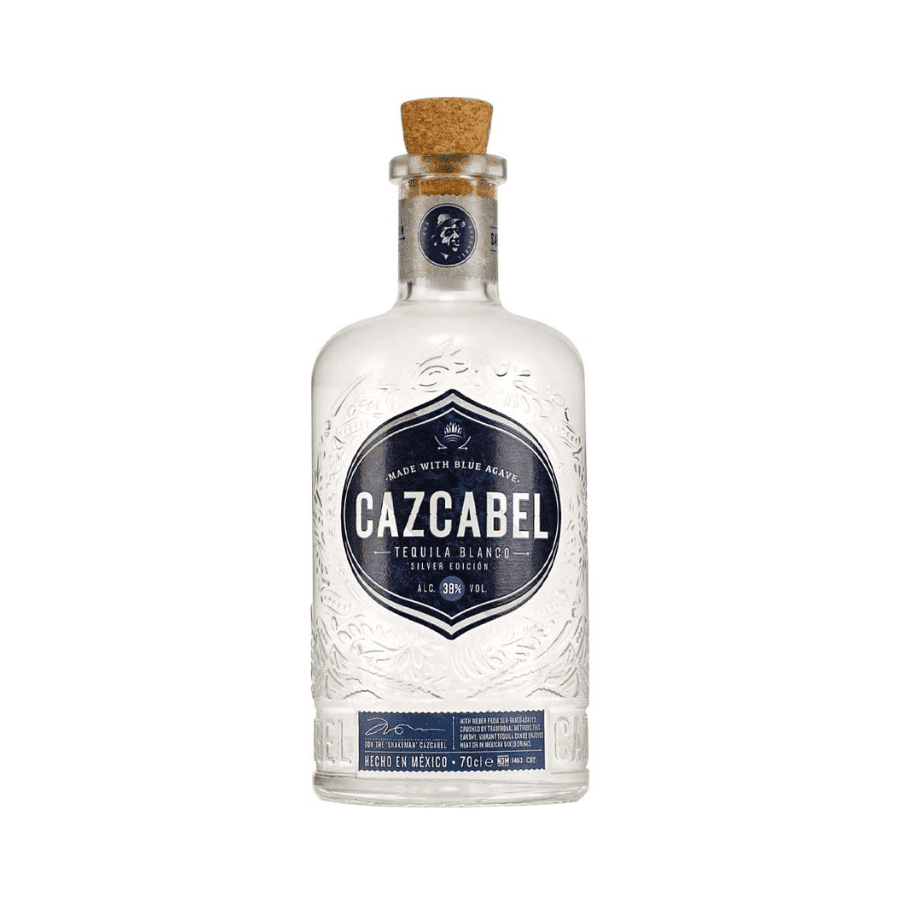 Botella de tequila Cazcabel Blanco con diseño grabado y tapón de corcho. Elegante y artesanal.