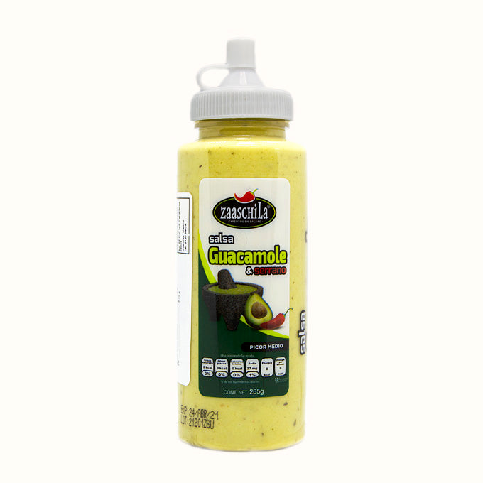 Envase plástico transparente con dosificador blanco. Etiqueta blanca y verde de la marca zaaschila con etiquetado  e imagen de un molcajete con aguacate y chile rojo.