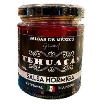 Frasco de salsa hormiga gourmet de Tehuacán, elaborado artesanalmente con ingredientes mexicanos auténticos.