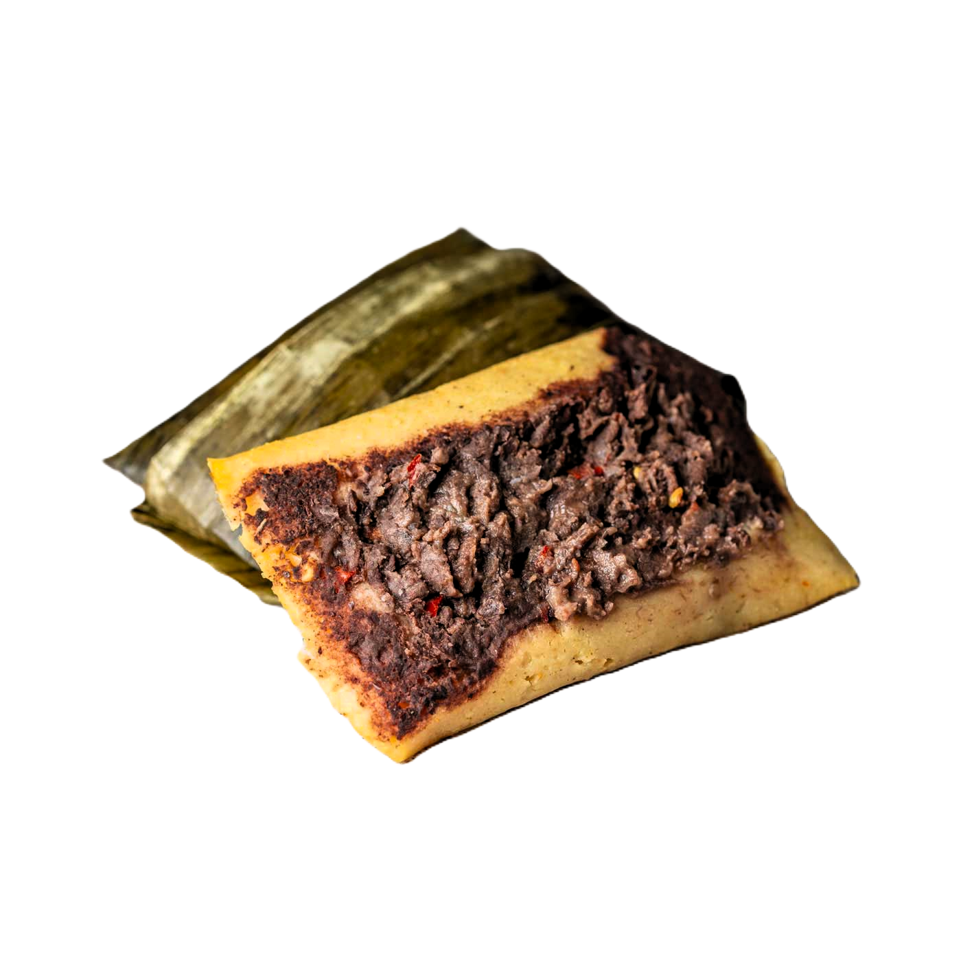 Suave tamal relleno de frijoles con un toque picante, perfecto para los amantes del sabor intenso.